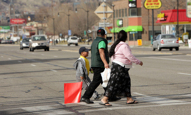 Pedestrians use a cross walk on State Street and 1500 South in Salt Lake City Thursday, March 15, 2012. A girl was hit last night in the cross walk. (Photo: Jeffrey D. Allred, Deseret News)