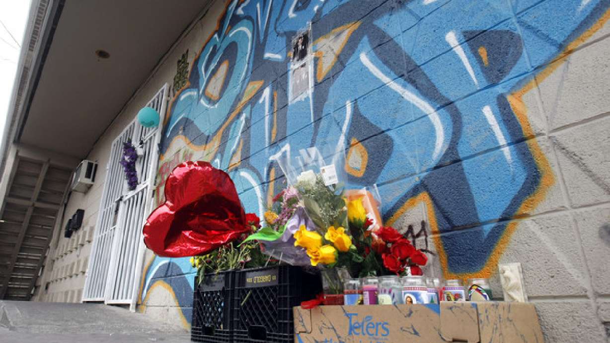 Memorial honors man shot at smoke shop