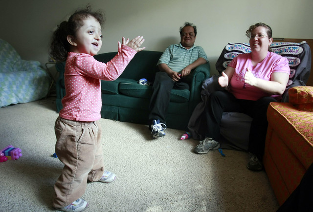 Helping Elyza eat: Family struggles to give daughter better life