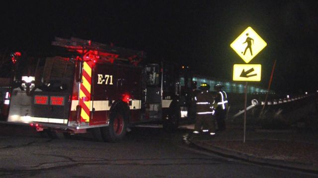 Fire crews respond to the scene at 400 W. State Street in Farmington, where Andrew Tolman, 16, was hit and killed Tuesday, March 27, 2012, while walking his bike across a crosswalk.
