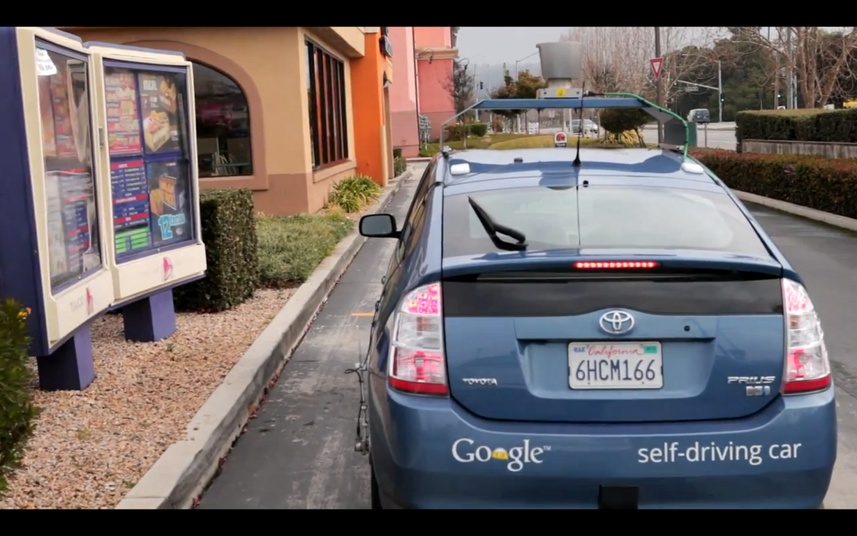 Steven Mahan, along with a couple Google technicians, make a quick pit stop while taking a spin in the self-driving car.