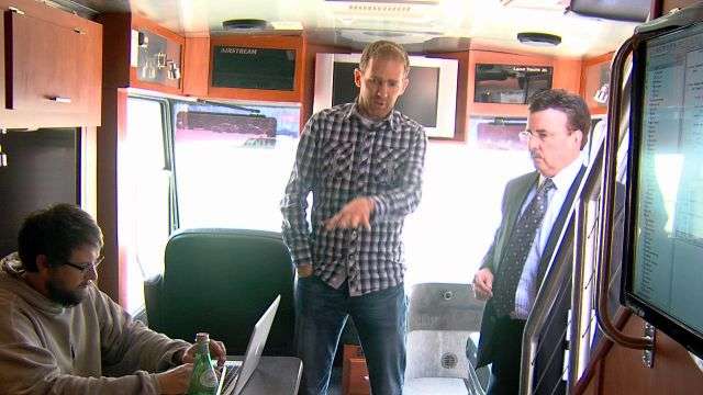 Morgan Lynch, CEO of Needle, shows KSL's Keith
McCord the inside of his bus headquarters.