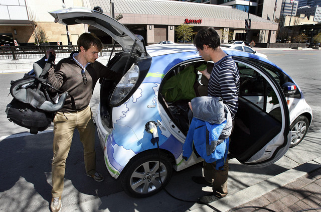 The world's first round-the-world tour in a standard electric car stops in Salt Lake Tuesday, April 3, 2012. Electric Odyssey stops to recharge on this inaugural journey west. Xavier Degon, right, and Antonin Guy, the Electric Odyssey crew, kicked off their journey Feb. 11, 2012, from Strasbourg, France.