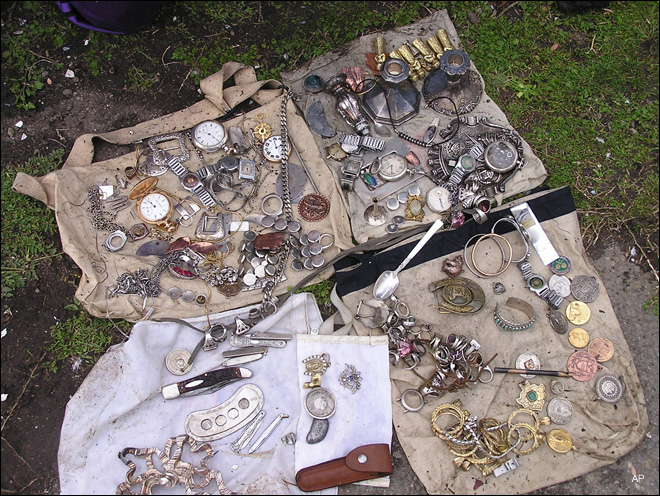 Students find buried treasure during lake clean-up