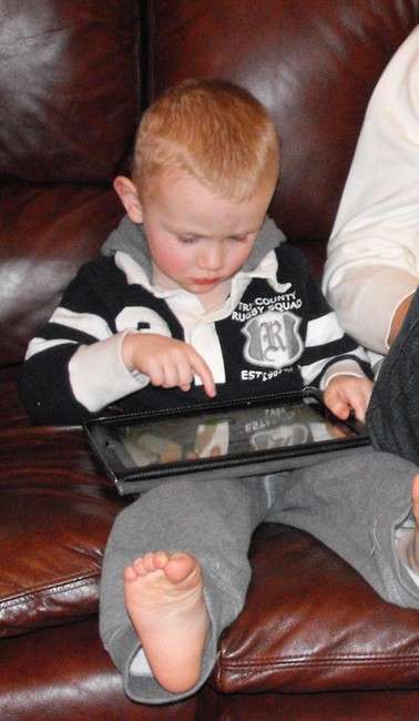 Learning letters on the iPad. (Photo: LeAnn Mills)