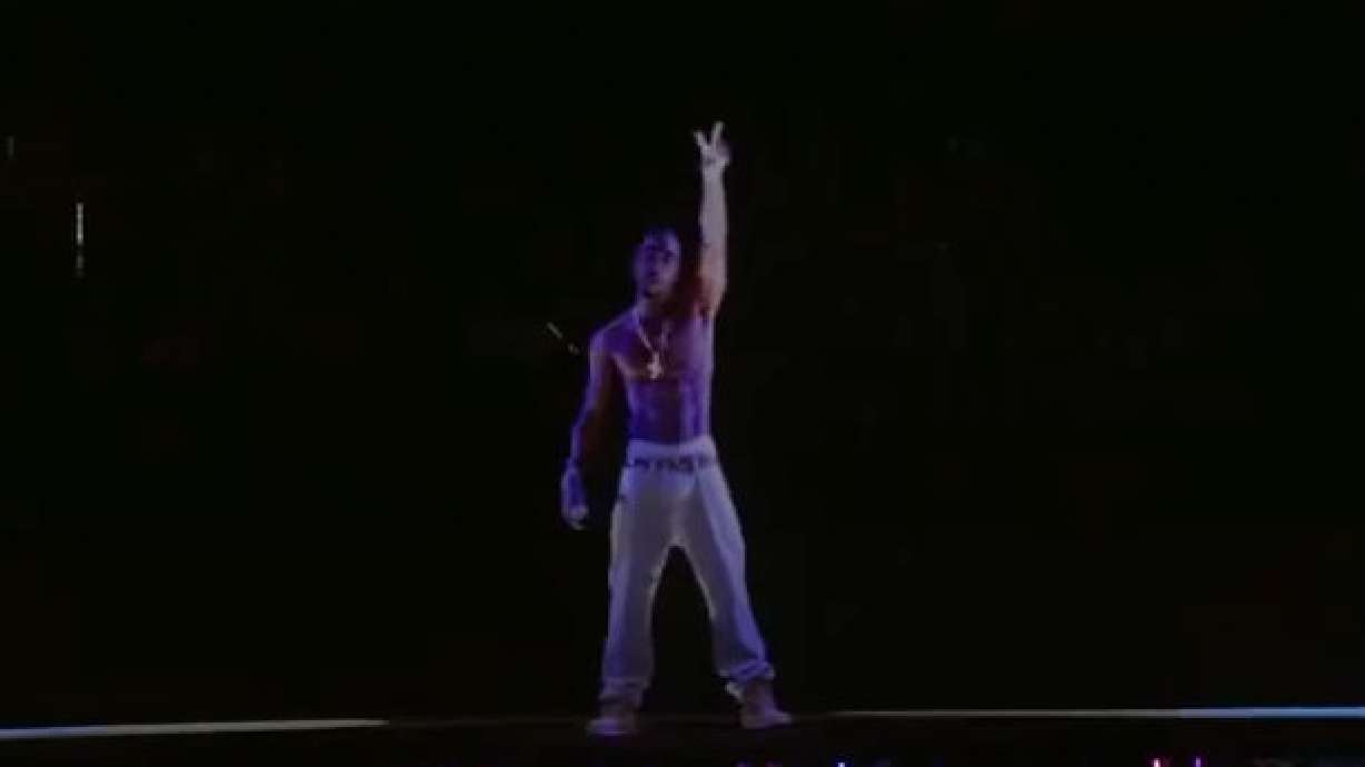 Tupac hologram performs with Dr. Dre and Snoop Dogg
