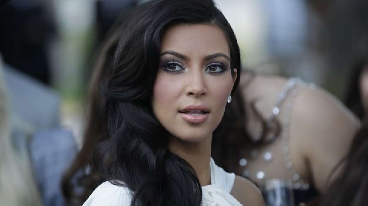 Romney camp attacks 9-yr-old Obama, and Kim Kardashian for mayor?