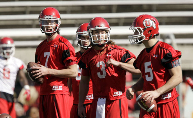 Utah Utes quarterbacks Travis Wilson (7), Jon Hays (9), Jordan Wynn (3) and Chase Hansen (5) throw in the first spring football practice in Salt Lake City Tuesday, March 20, 2012. (Jeffrey D. Allred, Deseret News)