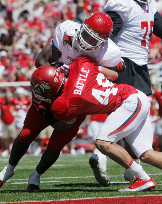 Red's #46 Jeff Battle keeps White's #13 Kelvin York out of the end zone during the Utah football Red & White Spring Game Saturday, April 21, 2012 at Rice Eccles Stadium. (Scott G Winterton, Deseret News)