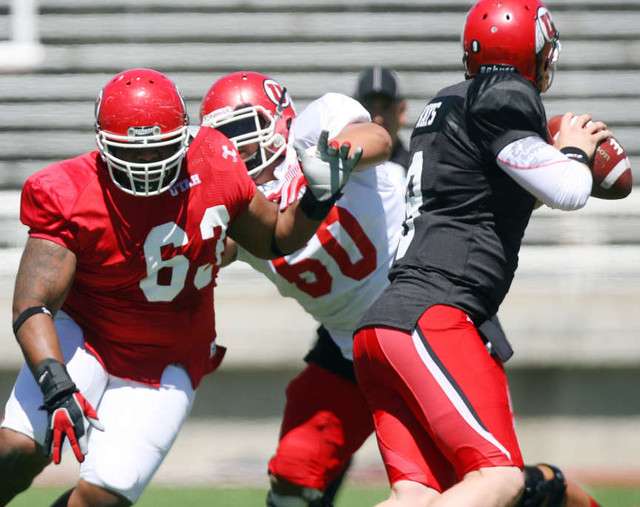 Red's #63 Joape Pela gets around White's #60 Siaosi Aiono for a sack on White's #9 Jon Hays during the Utah football Red & White Spring Game Saturday, April 21, 2012 at Rice Eccles Stadium. (Scott G Winterton, Deseret News)