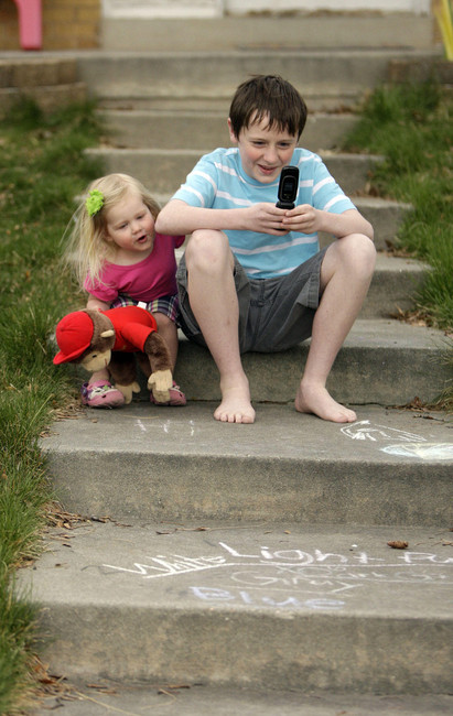 Growing number of children with cellphones adds pressure to purchase