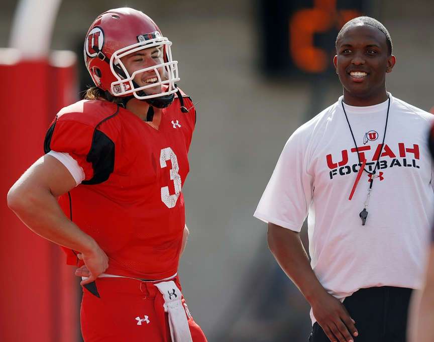 Utah quarterback Jordan Wynn and offensive coordinator Brian Johnson