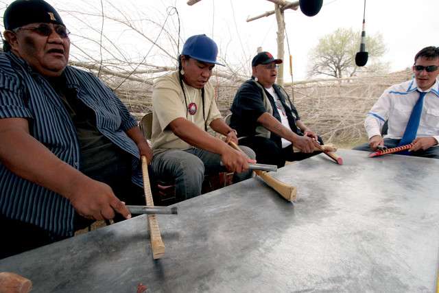 Lloyd Arrive, left, Ute Bear Dance Chief Skyler Lomahaftewa, Eric Wells and Sheriden Wells play traditional music at the Randlett Bear Dance in Randlett, Uintah County, on Monday, April 30, 2012. Instead of playing drums, the musicians play the rasp, whose sound is meant to mimic the growling and clawing of a bear who has just come out of hibernation in the spring.