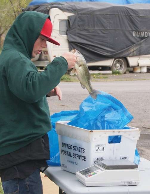 UVU Bass Club president Weston Brierley gets ready to weigh a bass caught during a club-sponsored tournament at Utah Lake. (Photo: Flint Stephens)