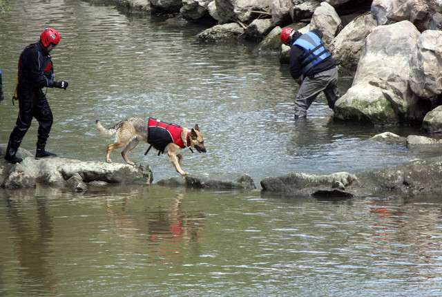 Search crews look for the body of 4-year-old Corbin Anderson who fell in the Weber River and disappeared last week in Ogden on Saturday, May 5, 2012.