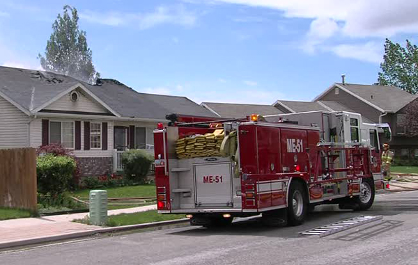 8-year-old 'Batman' alerts adults to house fire