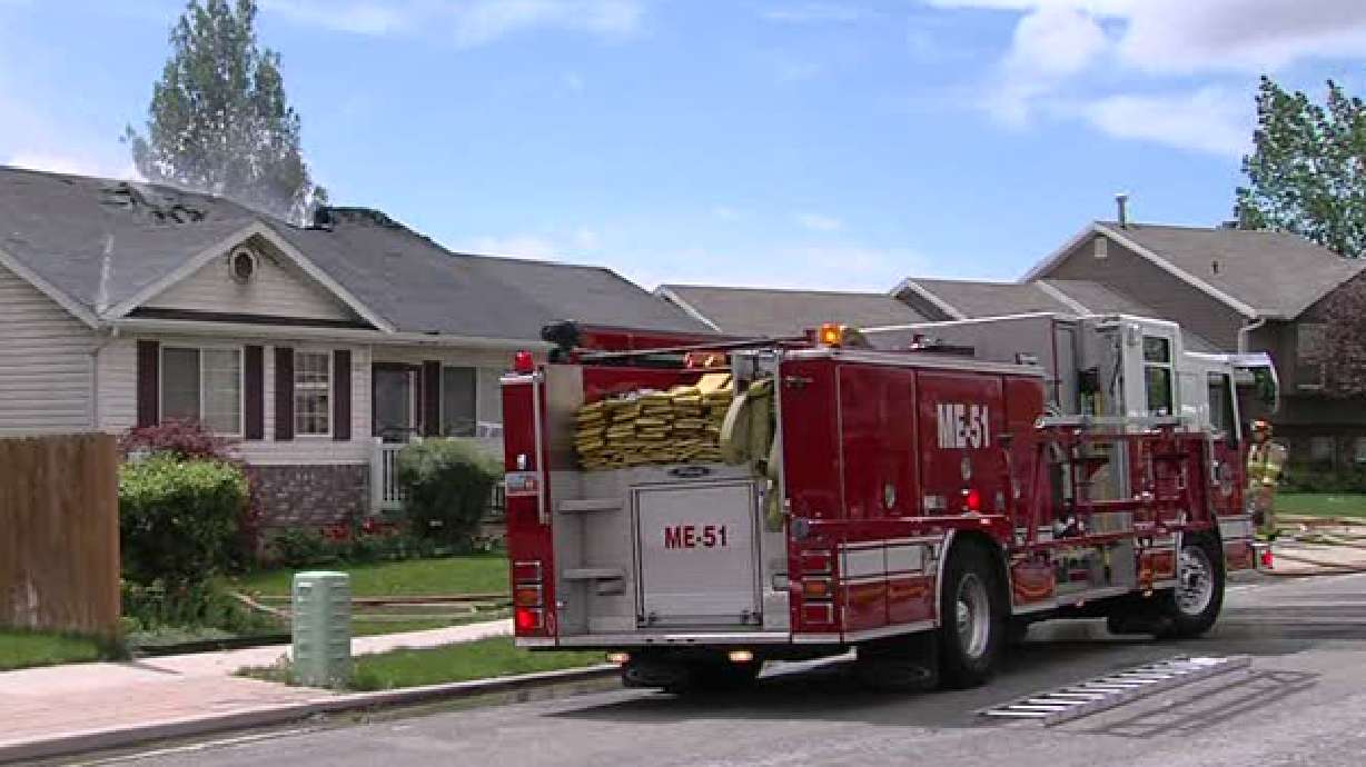 8-year-old 'Batman' alerts adults to house fire