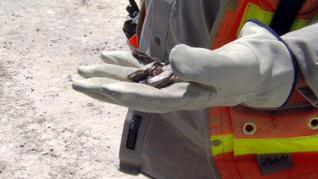 Some of the leftover ordinance can look like what people think a bomb would look like. Some might look like a beer can. Some might like more rusted over chinks of metal, like the ordinance above.