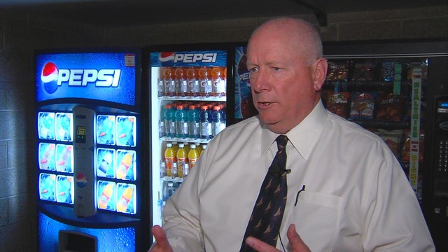 Davis High principal Dee Burton said that money from vending machines helps pay for students' arts programs.