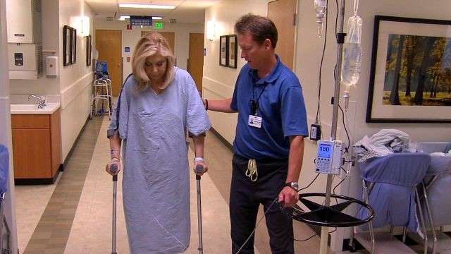 Just hours after her hip replacement surgery, Carole Mikita was up and walking on her new joint.