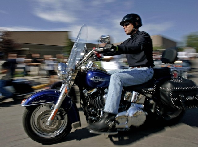 Utah Gov. Jon Huntsman rides a motorcycle at the Sturgis Motorcycle Rally Aug. 7, 2006, in Sturgis, S.D. Huntsman has been named one of the "21 Sexiest Men Over 50," according to the AARP. (Photo: Morry Gash, AP)