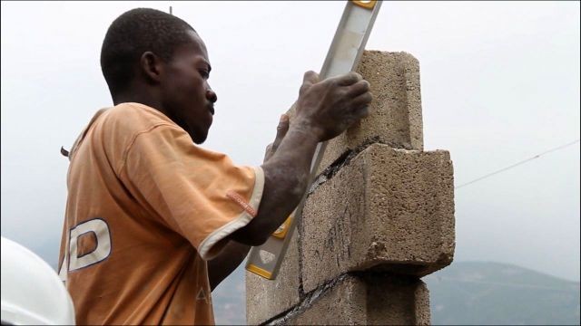 Haiti slowly being rebuilt by locals, charities