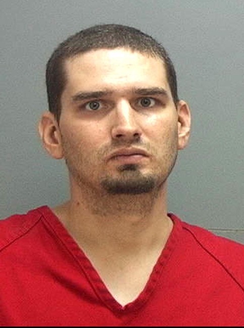 Ryan Randy Robinson, 31, is charged with murdering his girlfriend, 25-year-old Shantelle Reid, on April 8, 2012. Robinson was shot by a Murray police officer following the killing. That shooting was determined Tuesday to be legally justified. (Photo: Salt Lake County Jail)
