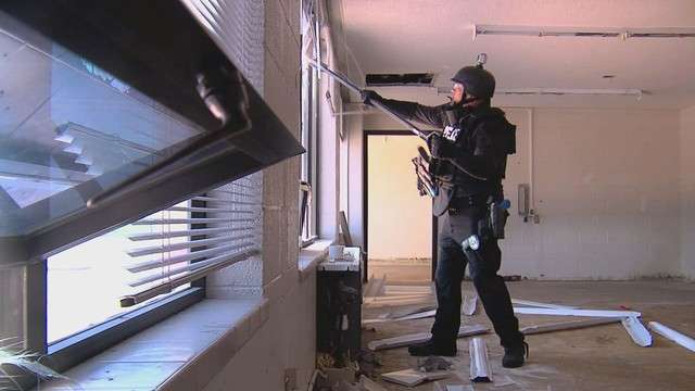 Since the Promontory Tower dorms will be torn
down anyway, the SWAT teams get to make as big
of a mess as they need to while training
inside.