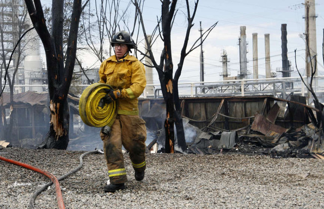 Grass fire near refinery under investigation
