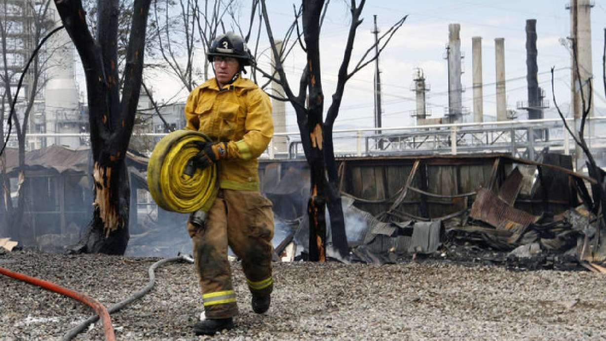 Grass fire near refinery under investigation