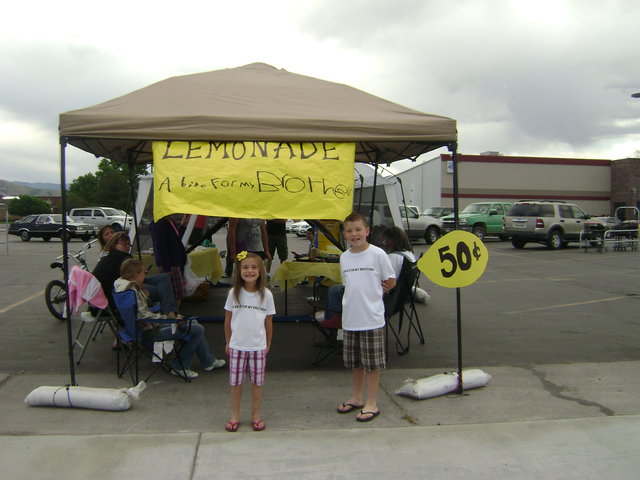 With lemonade, siblings earn bike for disabled brother