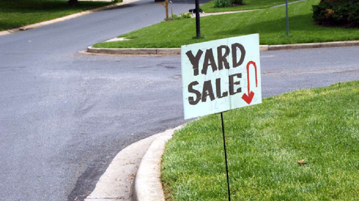 Couple finds stolen property at neighbor's garage sale