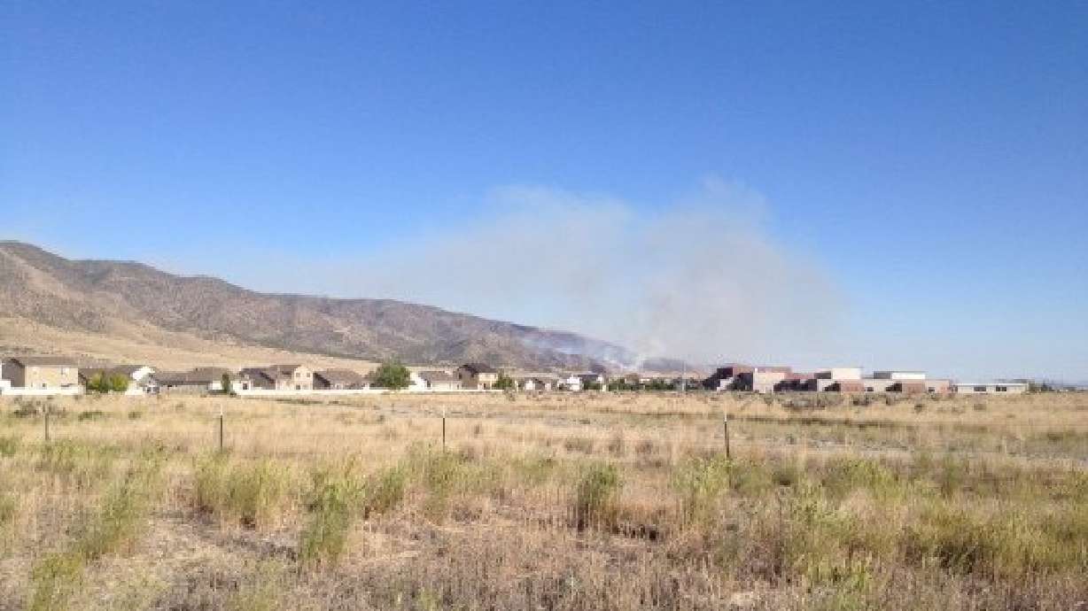Human-caused fire burns in Utah County