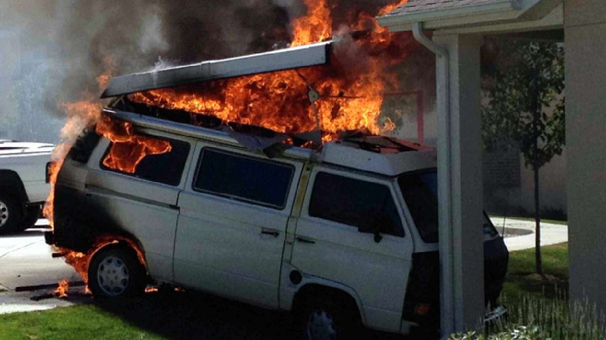 Van catches fire, rolls uphill then into Sandy home