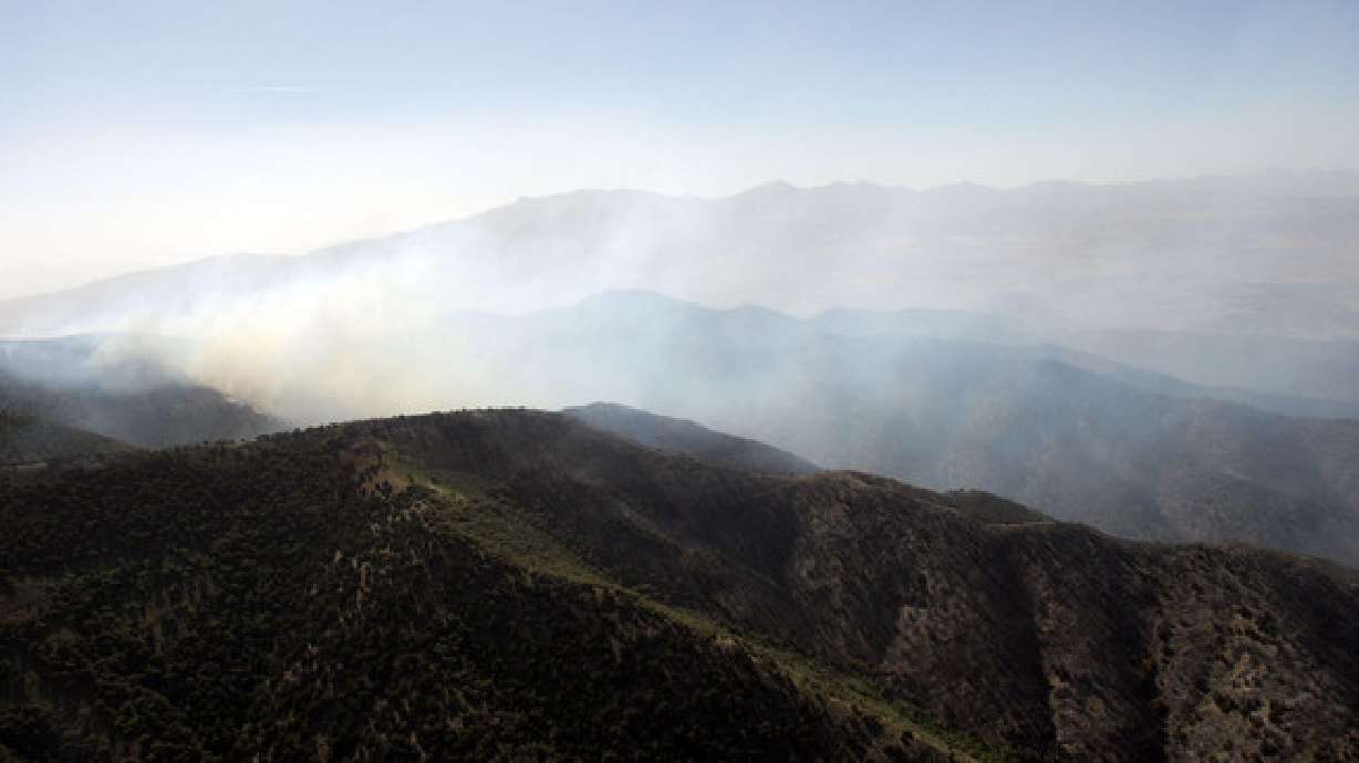 Grateful residents return home as Eagle Mountain fire burns