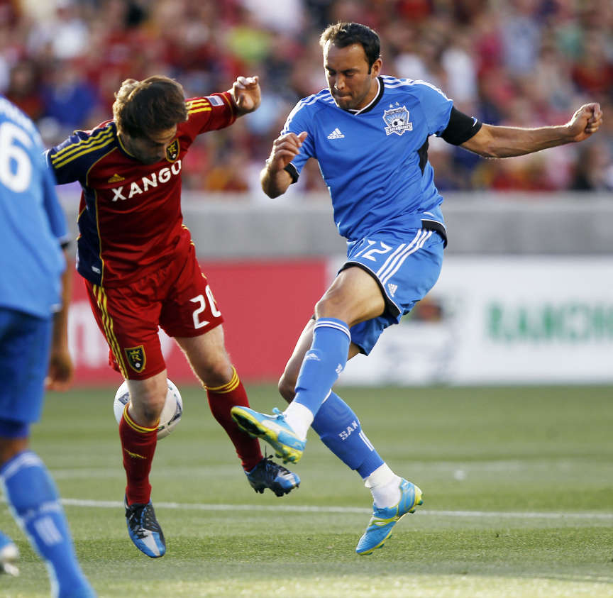 Ned Grabavoy of Real Salt Lake battles for the ball against Ramiro Corrales of the San Jose Earthquakes during their MLS matchup at Rio Tinto Stadium in Sandy Saturday, June 23, 2012. (Brian Nicholson, Deseret News)