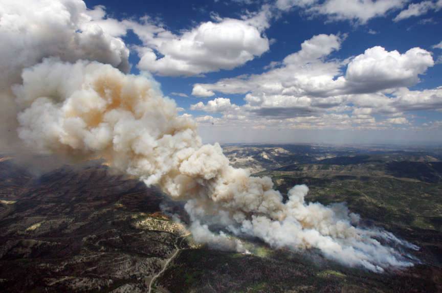 Church Camp Fire grows, destroys structures