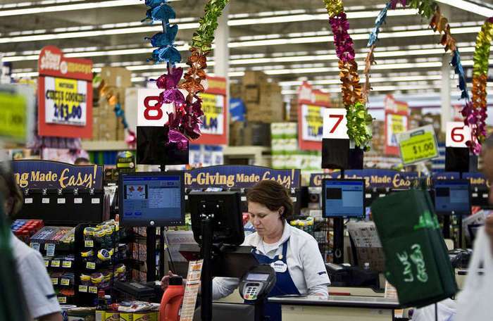 Checker at a grocery store (Mike Terry, Deseret
News)