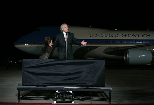 President Bush addresses a crowd of several thousand supporters after landing at Salt Lake International airport on Wednesday, Aug. 30, 2006 in Salt Lake City, Utah. (AP Photo/Evan Vucci)