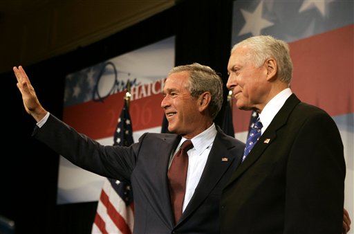 President Bush waves to the crowd during a fundraiser for the reelection campaign of Sen Orrin Hatch, R-Utah, right, on Thursday, Aug. 31, 2006 in Salt Lake City, Utah. (AP Photo/Evan Vucci)