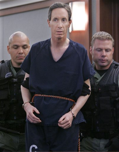 Warren Jeffs is led by guards into a courtroom in Las Vegas on Thursday, Aug. 31, 2006. Jeffs waived his right to extradition and will be returned to Utah for trial. Jeffs is the leader of the Fundamentalist Church of Jesus Christ of Latter Day Saints and is known to his followers as 'The Prophet.' (AP Photo/Laura Rauch)