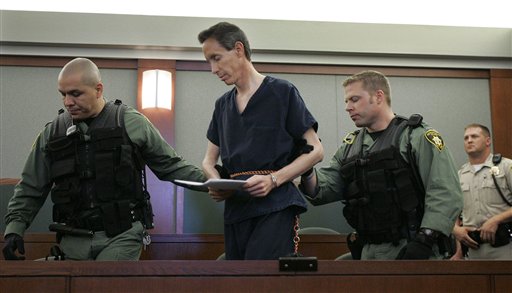 Warren Jeffs is led away after appearing in a courtroom in Las Vegas, Thursday, Aug. 31, 2006. Jeffs waived his right to extradition and will be returned to Utah for trial. Jeffs is the leader of the Fundamentalist Church of Jesus Christ of Latter Day Saints and is known to his followers as 'The Prophet.' (AP Photo/Laura Rauch)