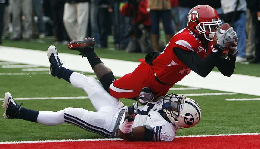Brigham Young Cougars cornerback Brian Logan (7) tries to defend Utah Utes wide receiver DeVonte Christopher (10) at the goal line. Christopher made the catch for the score as Utah and BYU play at Rice Eccles Stadium in Salt Lake City. Saturday, Nov. 27, 2010. (Photo: Scott G Winterton, Deseret News)