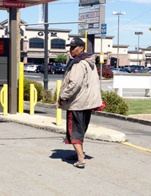 This photo was taken by Rena Carder of Terry Lee Black outside a Wells Fargo Bank that Black allegedly robbed on June 29, 2012 . Carder confronted Black because he was allegedly using her car in the robbery. Black walked. (Photo: Rena Carder)