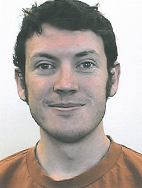 The gunman, identified by police as 24-year-old
James Holmes, used a military-style semi-
automatic rifle, a shotgun and a pistol,
stopping only to reload.