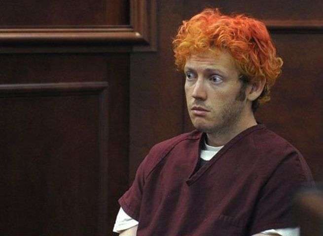 James E. Holmes appears in Arapahoe County
District Court, Monday, July 23, 2012, in
Centennial, Colo. Holmes is being held on
suspicion of first-degree murder, and could
also face additional counts of aggravated
assault and weapons violations stemming from
a mass shooting last Friday in a movie
theater in Aurora, Colo., that killed 12 and
injured dozens of others. (AP Photo/Denver
Post, RJ Sangosti, Pool