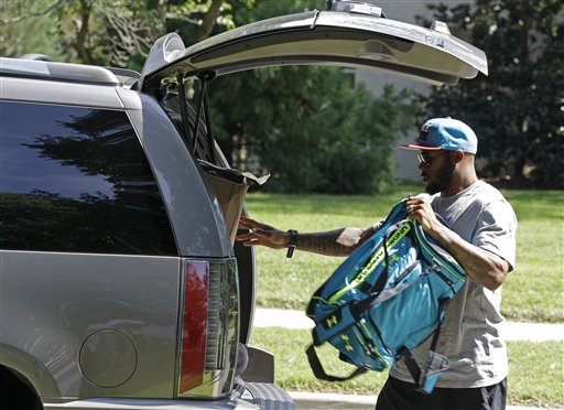 Carolina Panthers' Steve Smith arrives for the NFL team's football training camp in Spartanburg, S.C., Friday, July 27, 2012. Smith announced he is donating $100,000 to help the survivors of the movie-theater shooting in Colorado pay for medical expenses.(AP Photo/Chuck Burton)