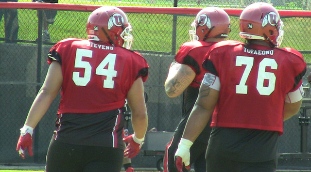 Utah center Tevita Stevens (54) and Jeremiah Tofaeono (79) during Saturday's practice up at the Ute baseball field in Salt Lake City. Photo: Robert Jackson, KSL