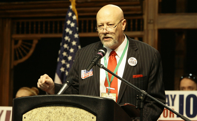Democratic congressional candidate Jay Seegmiller talks about his political ideas at the state Democratic convention in Salt Lake City, Saturday, April 21, 2012.