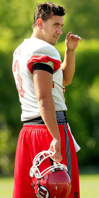Utah's Quarterback #3 Jordan Wynn takes off his helmet during football practice Monday, Aug. 20, 2012. (Scott G Winterton, Deseret News)